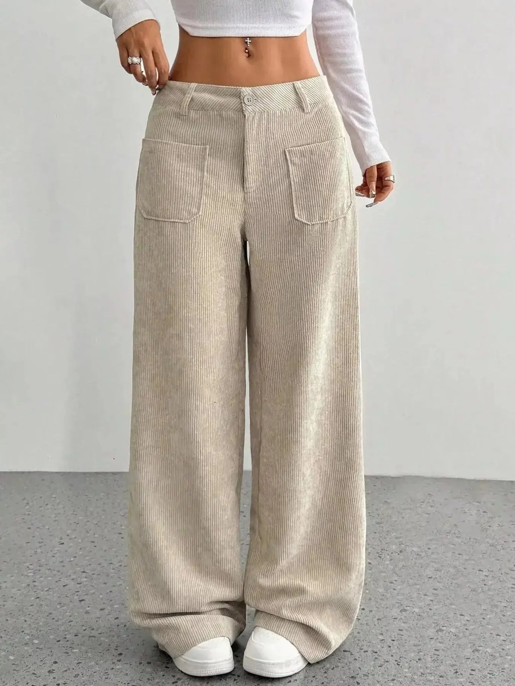 Women's high-waisted wide-leg corduroy pants by Plush Fashion Hub, shown in a soft, textured fabric with a relaxed fit.