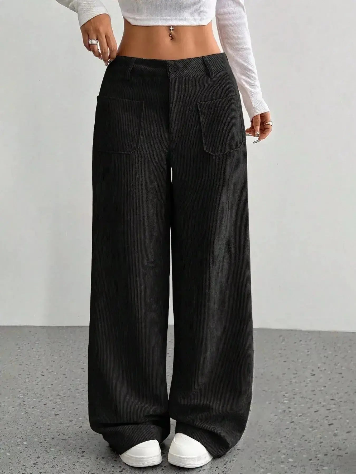 Women's high-waisted wide-leg corduroy trousers by Plush Fashion Hub, shown in a soft, textured corduroy fabric with a relaxed fit.