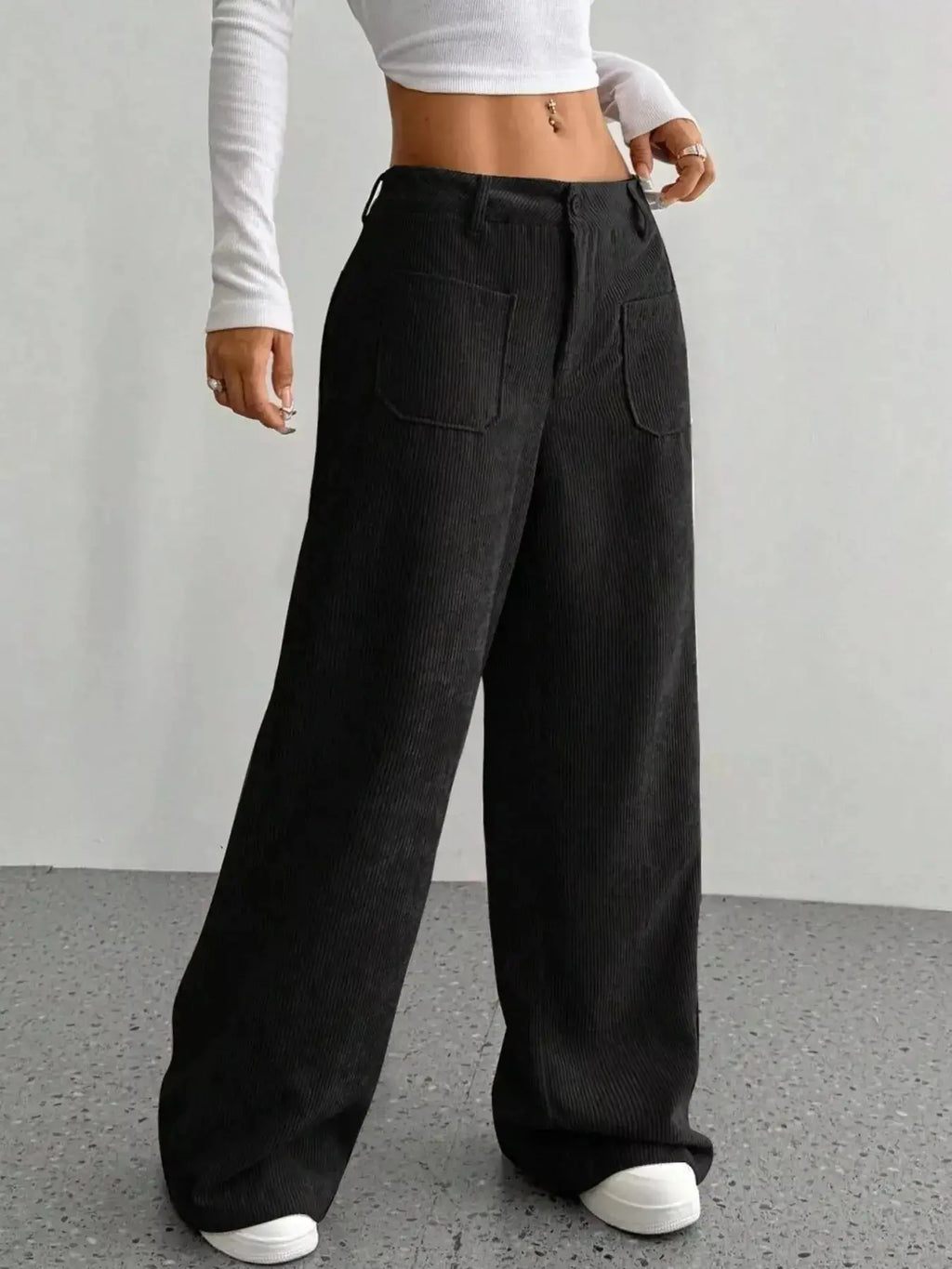 Women's high-waisted wide-leg corduroy pants by Plush Fashion Hub, featuring a soft textured fabric and relaxed fit.