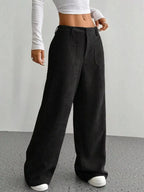Women's high-waisted wide-leg corduroy pants by Plush Fashion Hub, featuring a soft textured fabric and relaxed fit.