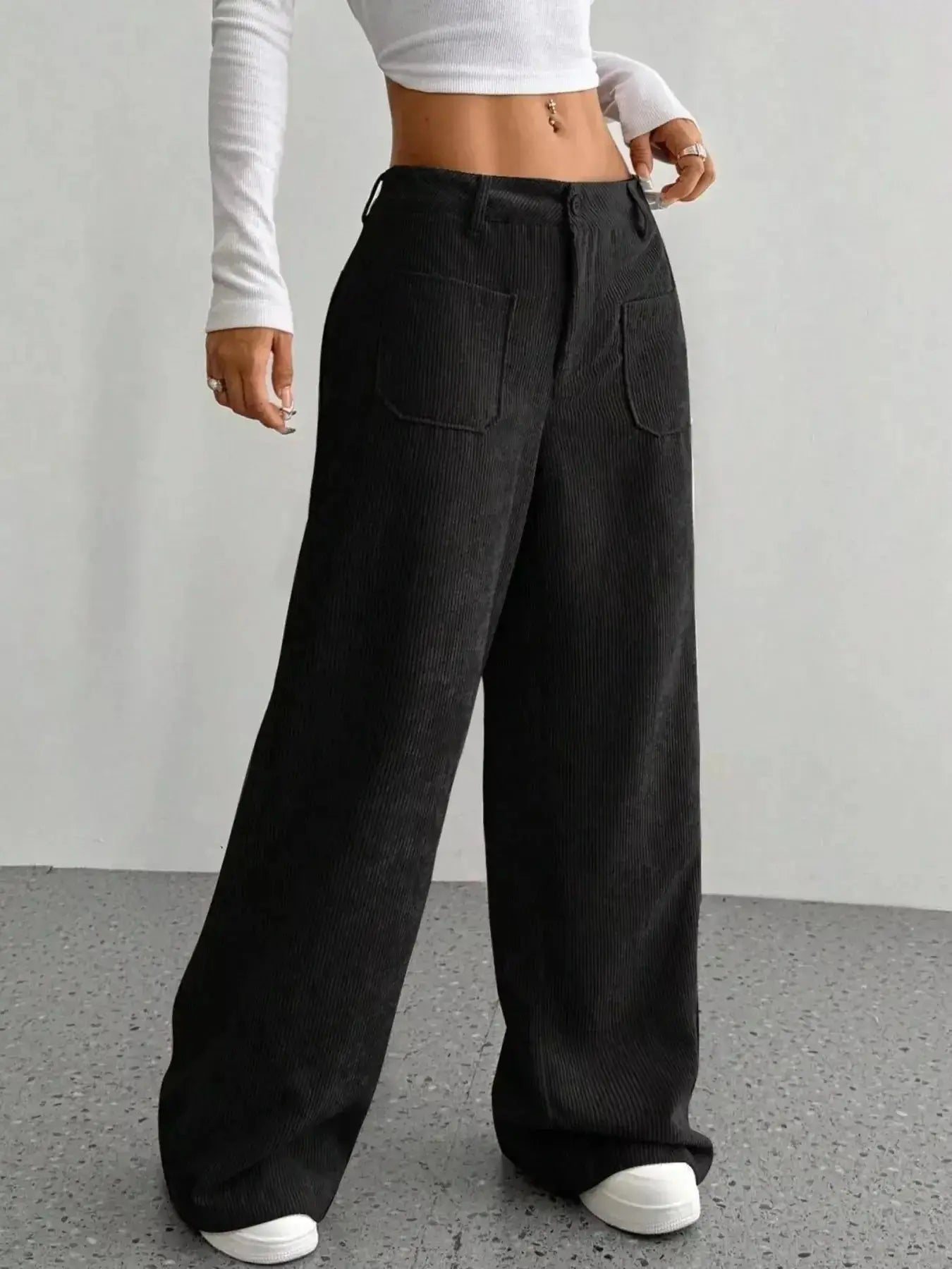 Women's high-waisted wide-leg corduroy pants by Plush Fashion Hub, featuring a soft textured fabric and relaxed fit.