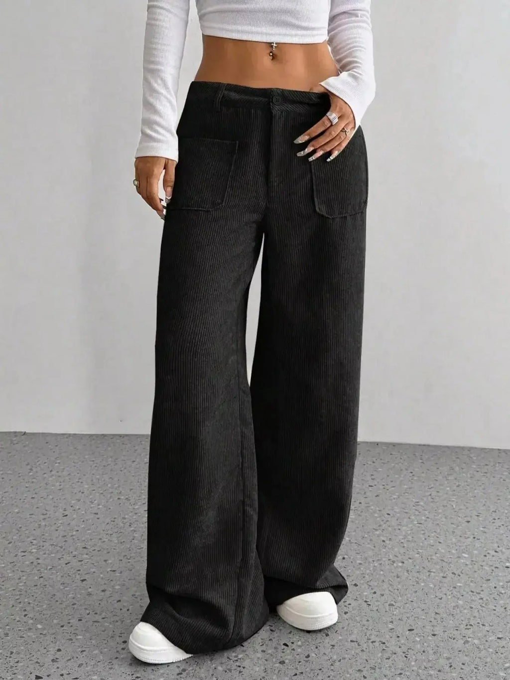 Women's high-waisted wide-leg corduroy pants by Plush Fashion Hub, shown in a stylish fit with a soft, textured fabric.