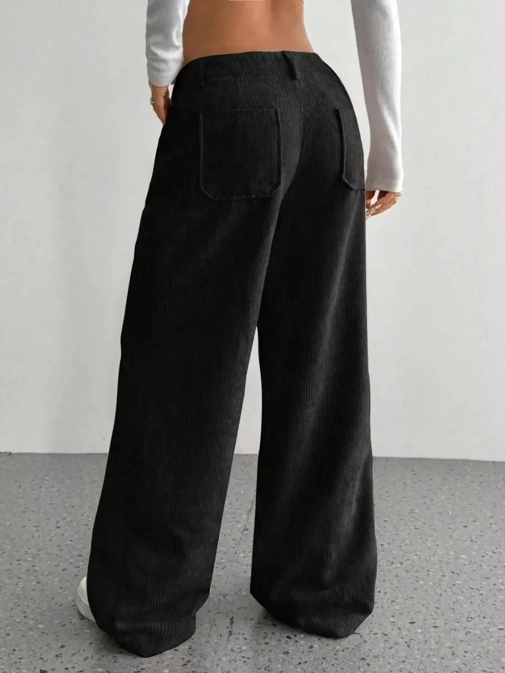 Women’s high-waisted wide-leg corduroy trousers by Plush Fashion Hub, featuring a soft textured fabric and relaxed fit.