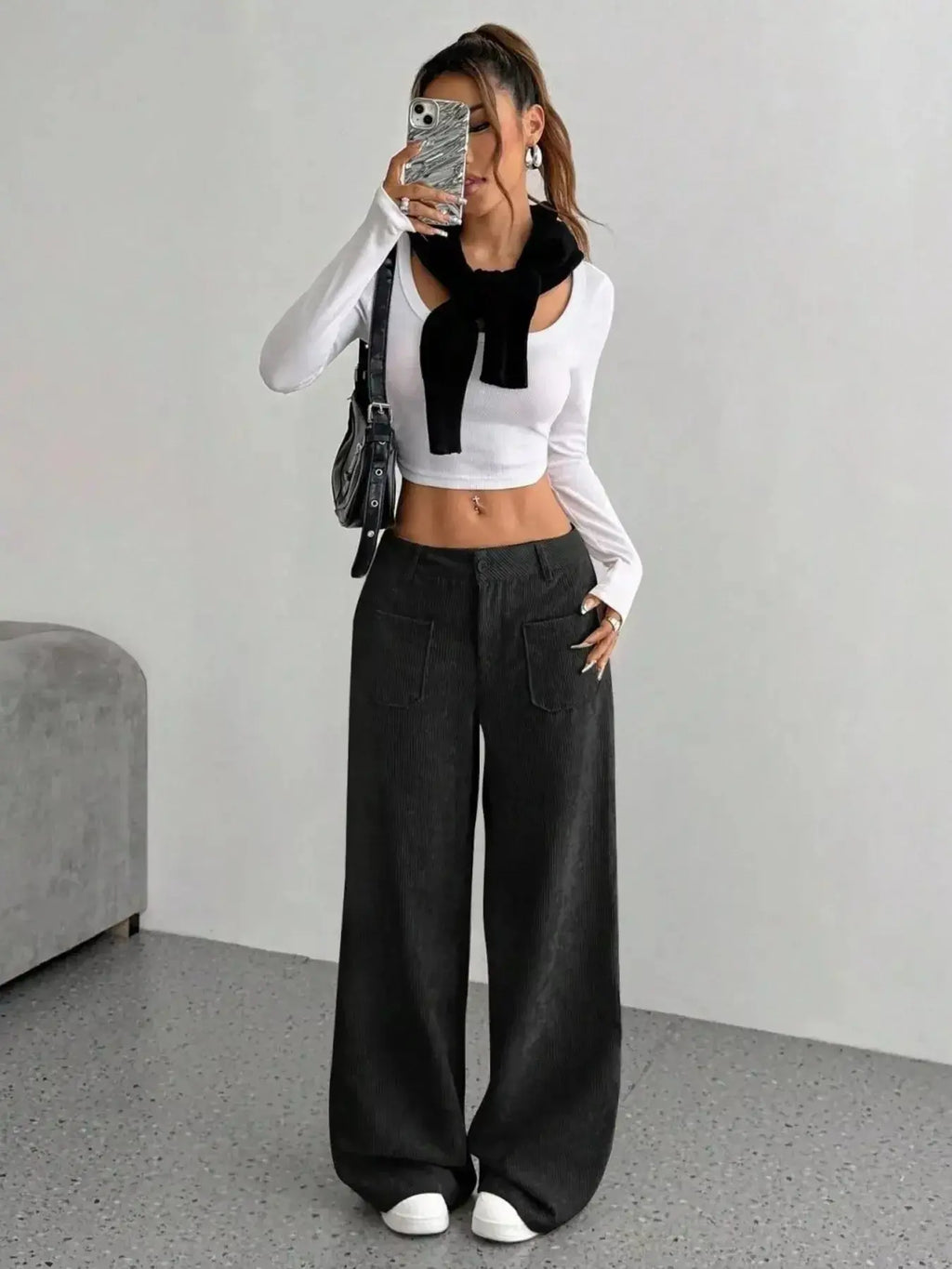 Women's high-waisted wide-leg corduroy trousers by Plush Fashion Hub, shown in a natural pose highlighting the relaxed fit and texture.