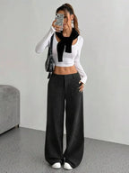 Women's high-waisted wide-leg corduroy trousers by Plush Fashion Hub, shown in a natural pose highlighting the relaxed fit and texture.