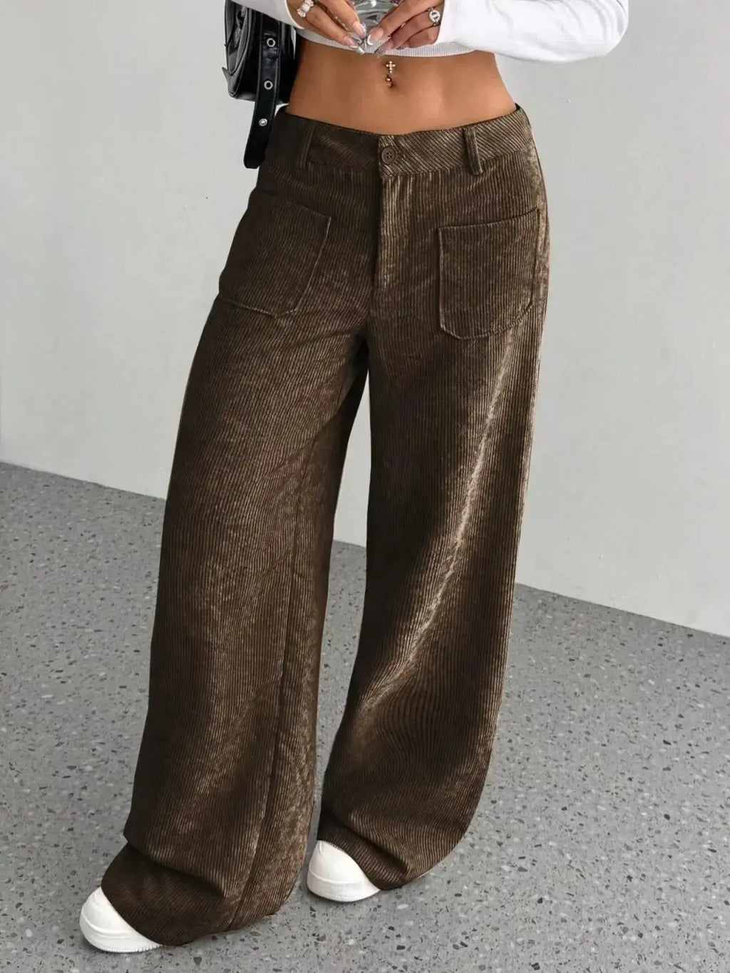 Women's high-waisted wide-leg corduroy trousers by Plush Fashion Hub, showing soft, textured fabric and relaxed fit.