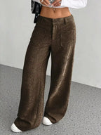 Women's high-waisted wide-leg corduroy trousers by Plush Fashion Hub, showing soft, textured fabric and relaxed fit.