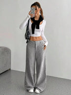 Women’s high-waisted wide-leg corduroy trousers by Plush Fashion Hub, featuring a textured fabric and relaxed fit.