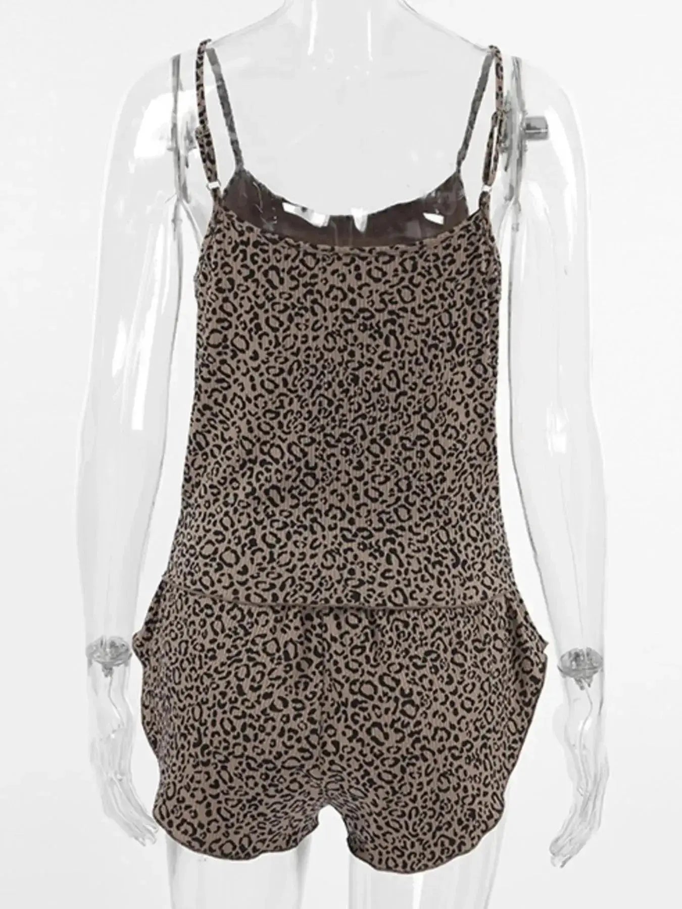 Women's leopard print pajama lounge set with cami, shorts, and cardigan by Trendsi, featuring a stylish and comfortable sleepwear ensemble.