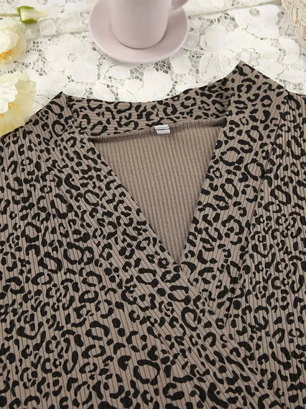 Women's leopard print pajama lounge set featuring a cami, shorts, and cardigan by Trendsi, casual and comfortable sleepwear.