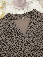 Women's leopard print pajama lounge set featuring a cami, shorts, and cardigan by Trendsi, casual and comfortable sleepwear.