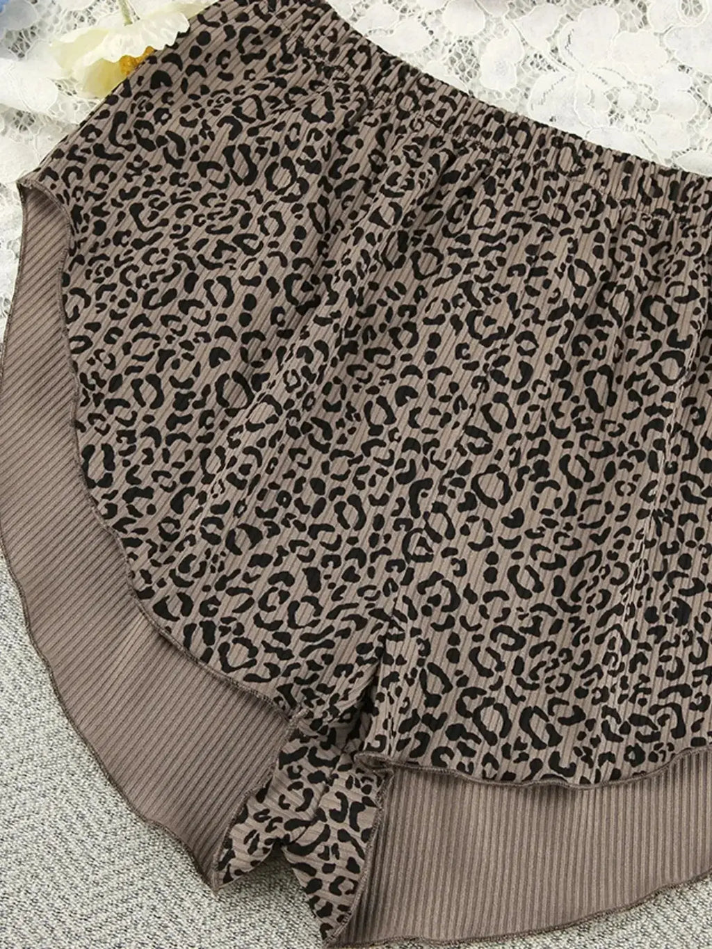 Women’s leopard print pajama set with cami, shorts, and cardigan, trendy lounge sleepwear by Trendsi.