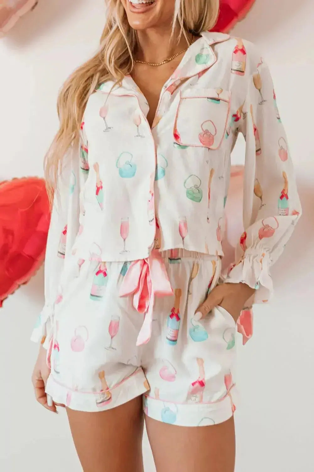 Women's bow print collared lounge top and drawstring shorts pajama set, comfortable sleepwear from Trendsi.