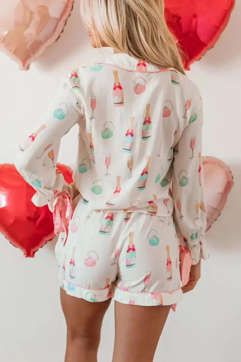 Women's bow print collared lounge top and drawstring shorts pajama set by Plush Fashion Hub, comfortable sleepwear for women.
