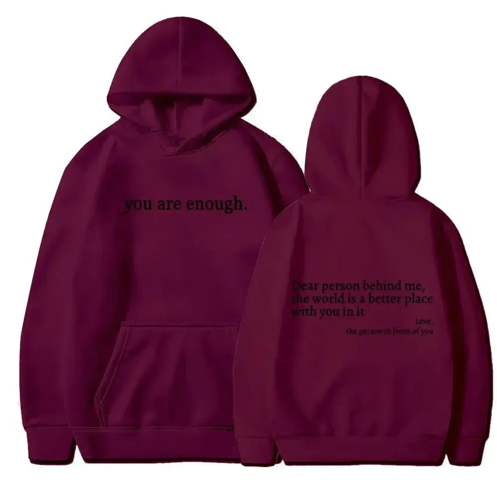 Women’s brushed fleece hoodie with letter graphic from Plush Fashion Hub, soft, oversized pullover for casual comfort.