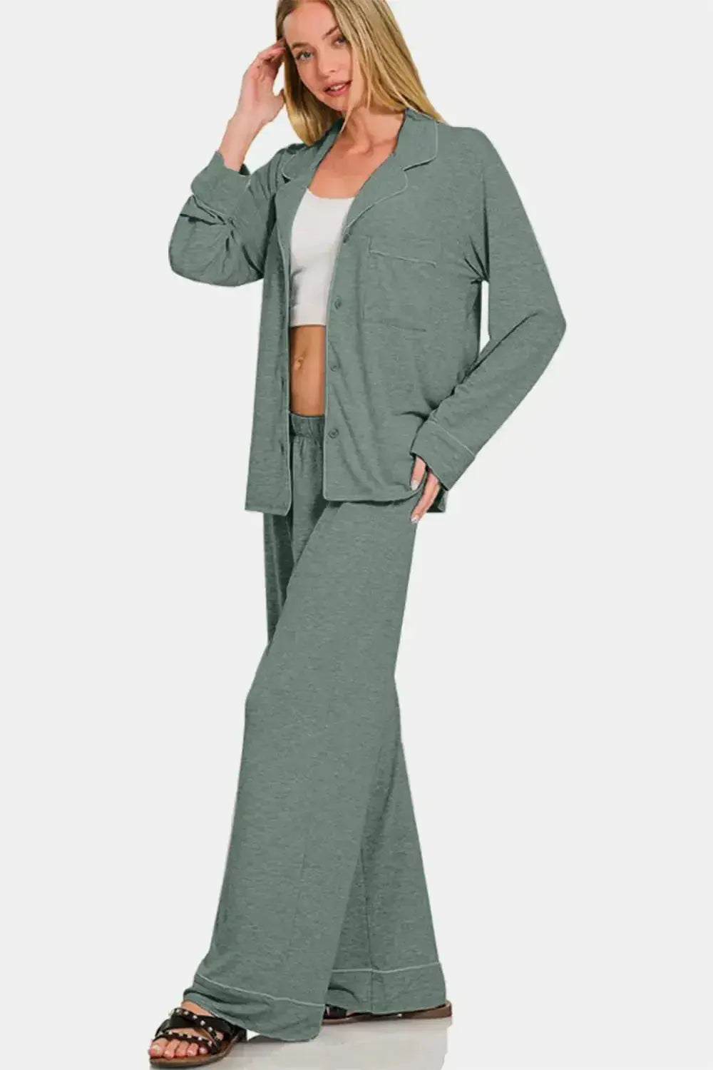 Women's button-down long sleeve lounge set by Trendsi, relaxed two-piece pajama outfit with soft fabric and comfortable fit.