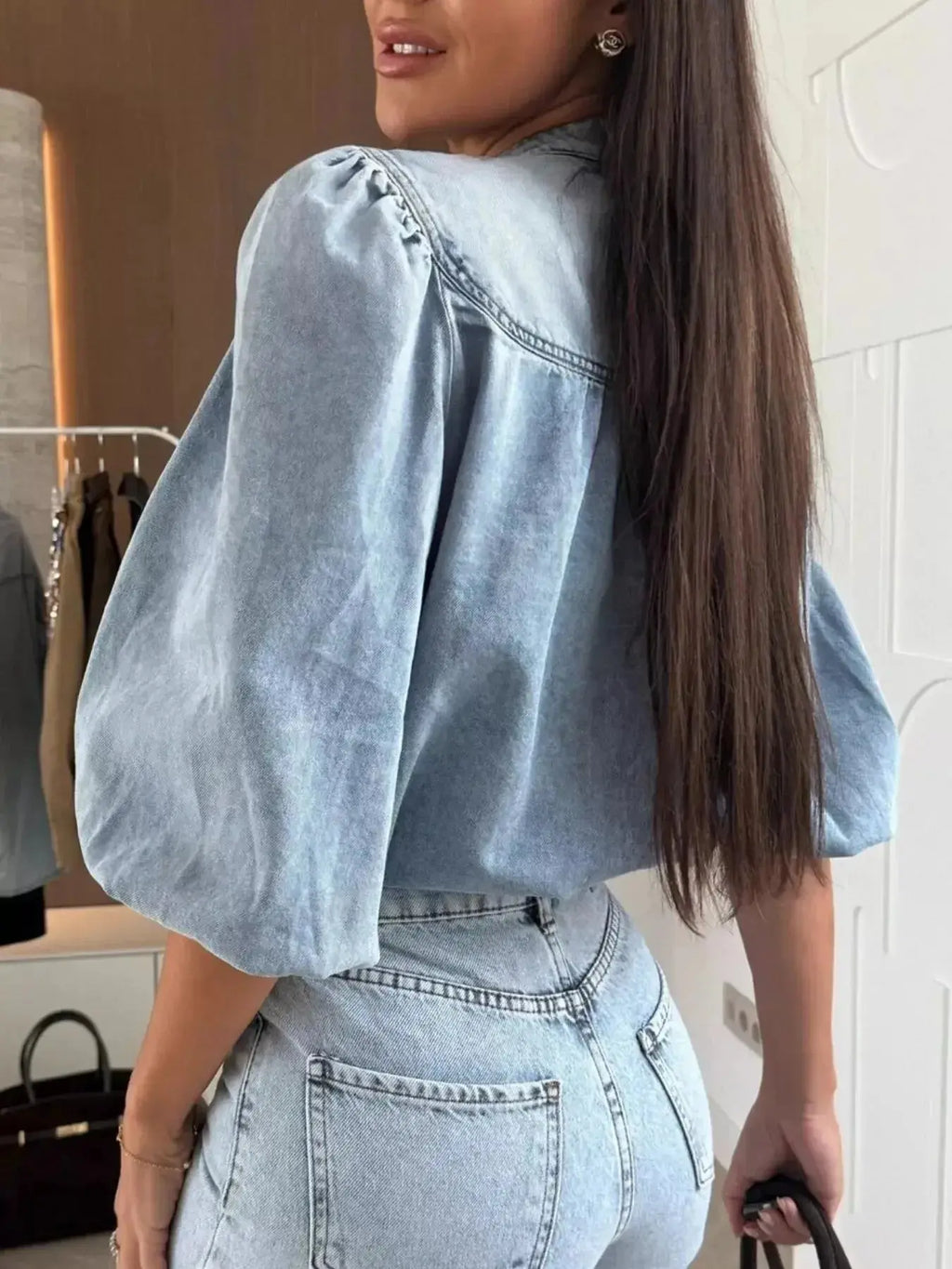 Women's button-down denim blouse with puff sleeves, structured casual chic style by Trendsi.