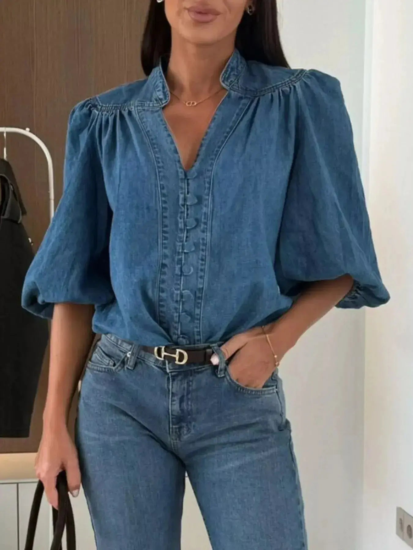 Women’s button-down puff sleeve denim blouse with structured casual chic style, featuring classic denim fabric and stylish design.