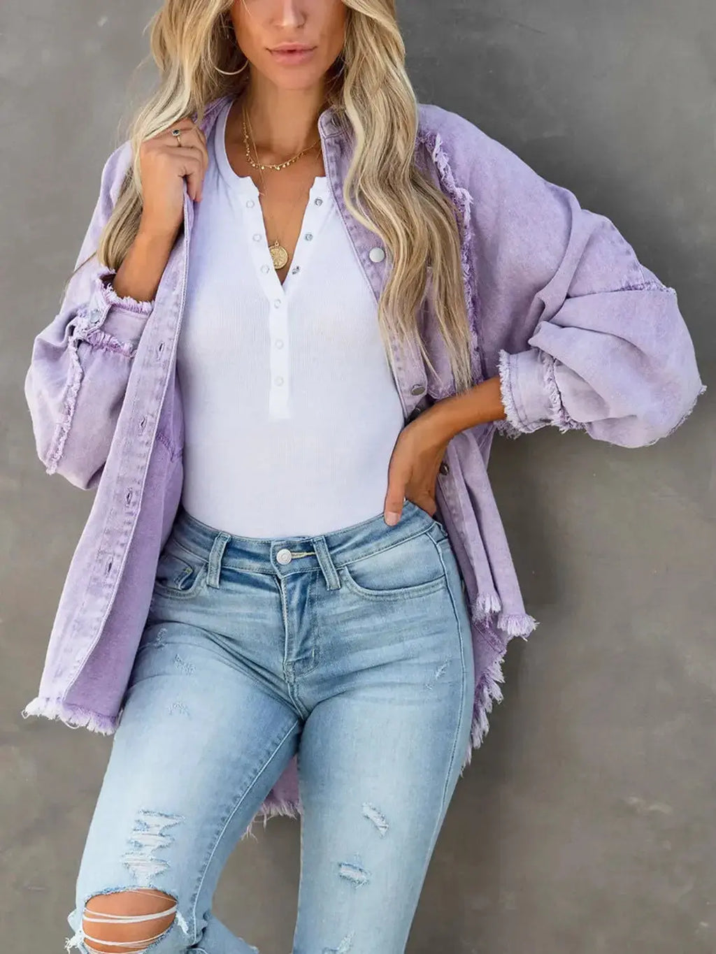 Women’s raw hem denim jacket by Trendsi, casual cotton blend outerwear with button-down front and classic denim style.