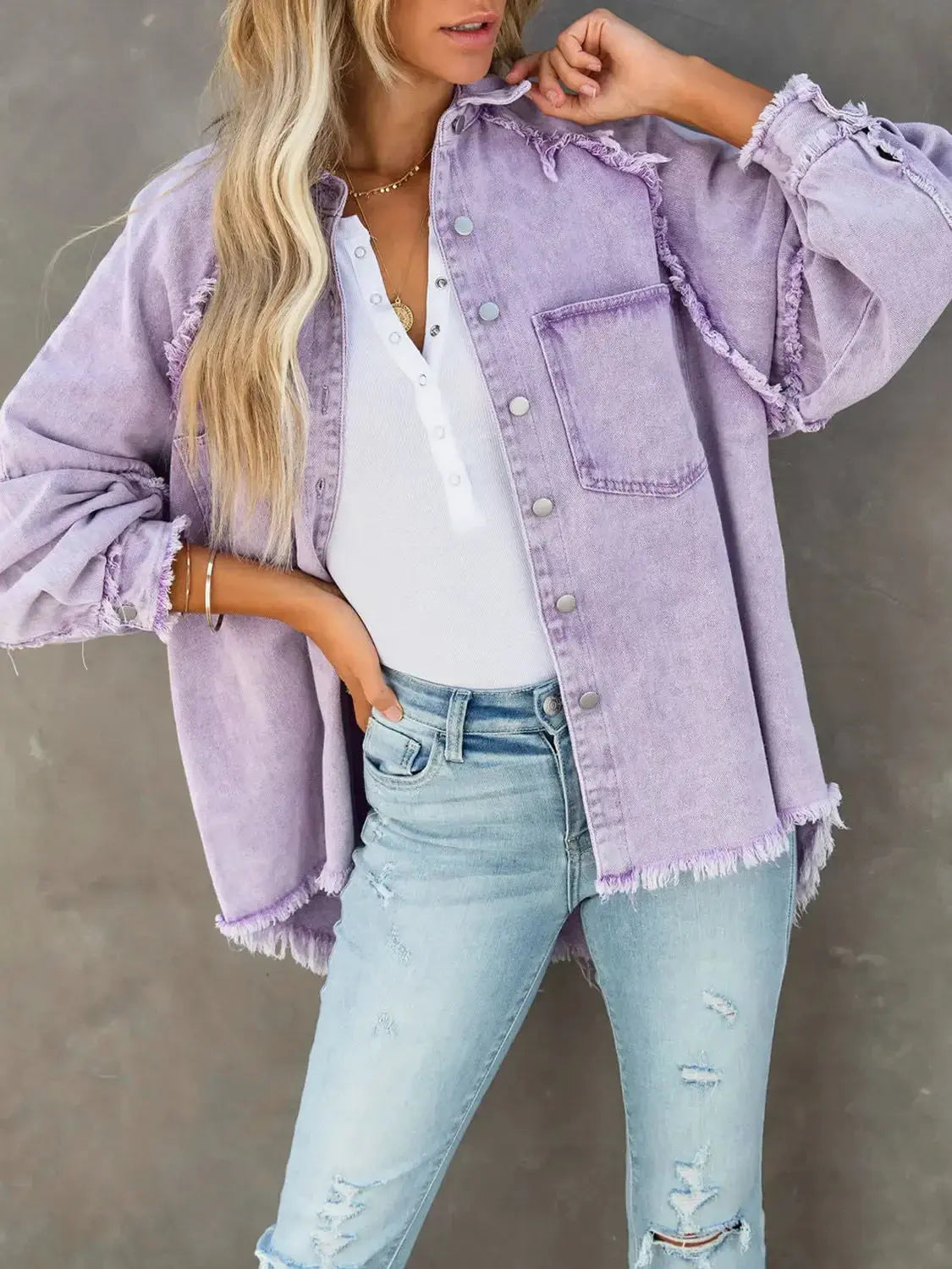 Women’s raw hem denim jacket by Trendsi, casual cotton blend outerwear with button-down front and classic denim style.