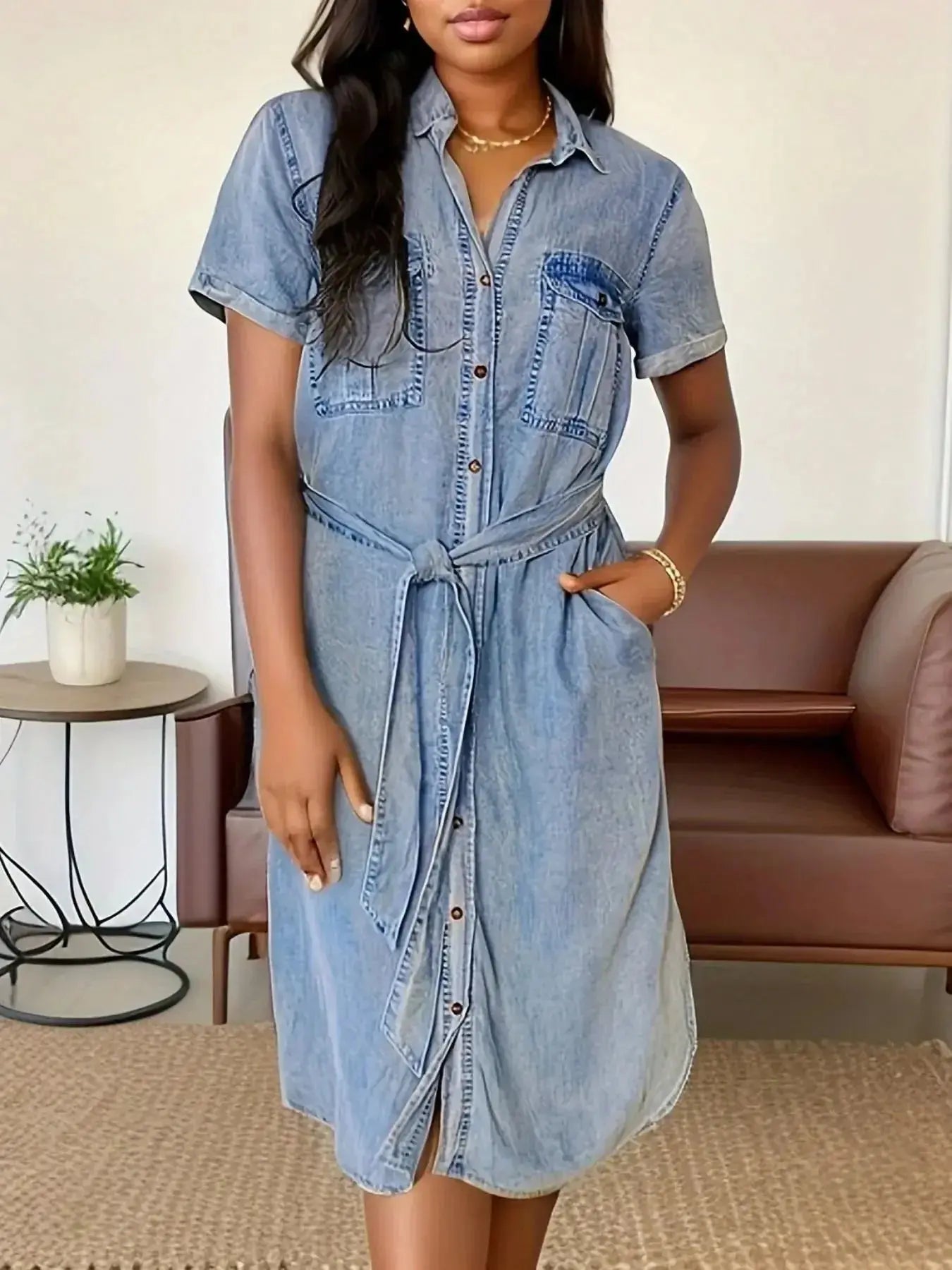Women's button-front belted denim dress with short sleeves, made from cotton blend fabric by Trendsi.
