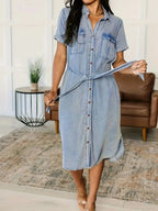 Women's button-front belted denim dress with short sleeves and cotton blend fabric, from Trendsi.