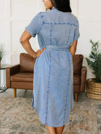 Women's button-front belted denim dress with short sleeves, made of cotton blend fabric by Trendsi.