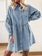 Women's casual denim shirt dress with button-up front and smocked cuffs, trendy Trendsi denim dress on a model.