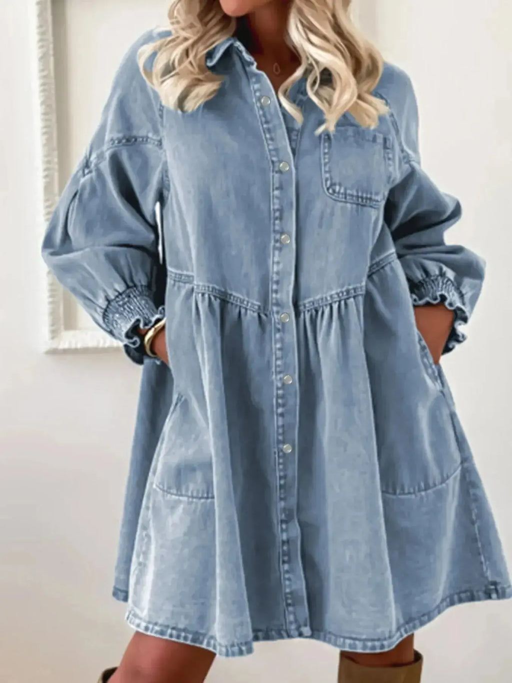 Women's casual denim shirt dress with button-up front and smocked cuffs, stylish Trendsi denim dress for everyday wear.