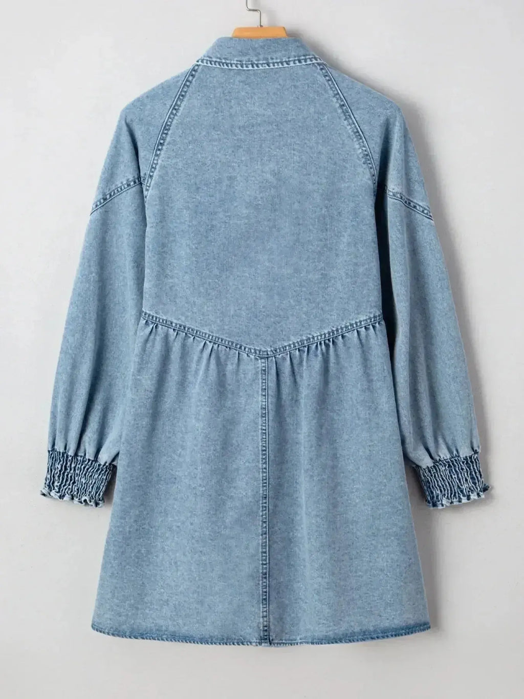 Women’s casual denim shirt dress with button-up front and smocked cuffs, trendy Trendsi denim dress for everyday wear.