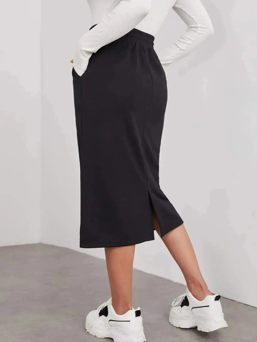 Women's casual drawstring midi skirt with pockets and side slit, trendy fashion skirt by Trendsi.