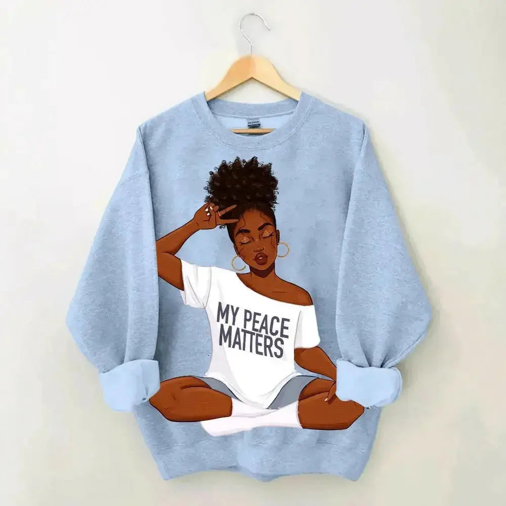 Women’s oversized casual hoodie with colorful graphic print, plush fabric, and relaxed fit from Plush Fashion Hub.