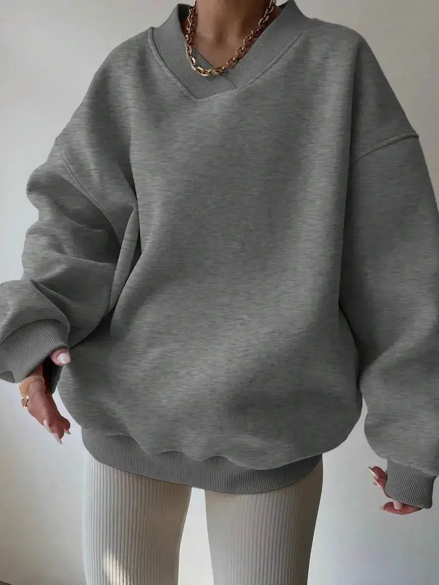Women's soft knit crew neck sweater by Plush Fashion Hub, solid color, long sleeve casual pullover with a cozy fit.