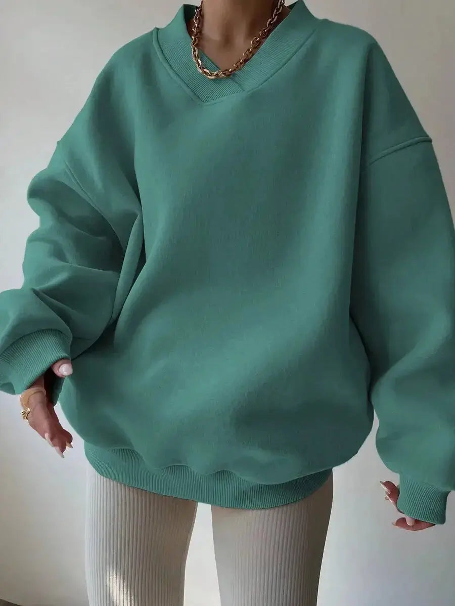 Women’s soft knit crew neck sweater with long sleeves, casual solid color pullover by Plush Fashion Hub.
