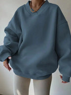 Women’s soft knit crew neck sweater by Plush Fashion Hub featuring long sleeves and a casual solid color design.