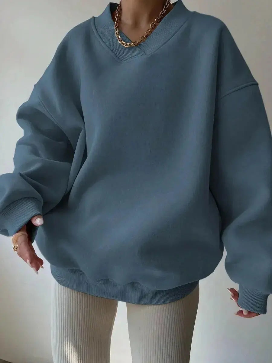 Women’s plush fashion hub soft long sleeve crew neck sweater in solid color, casual knit pullover for everyday wear.