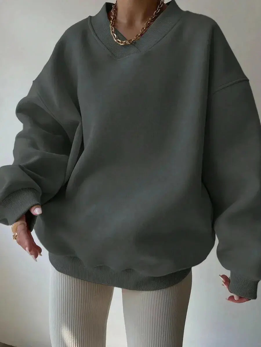 Women’s soft long sleeve crew neck sweater by Plush Fashion Hub, solid color knit pullover perfect for casual wear.