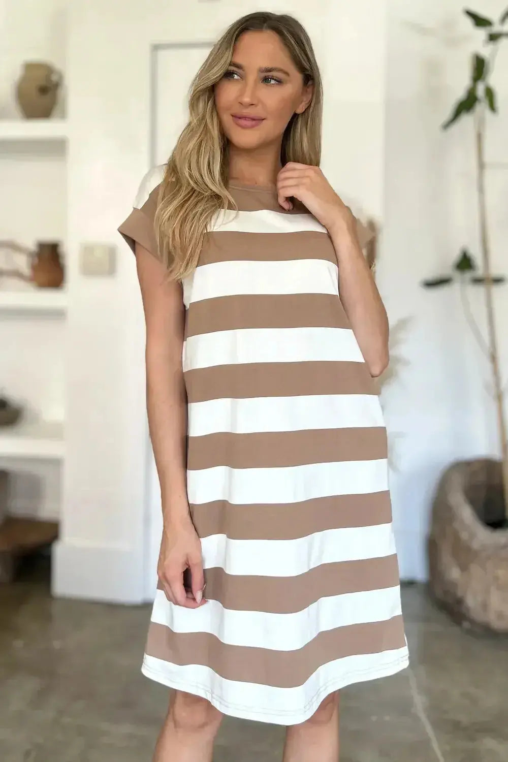Women's casual striped mini dress with round neck and cap sleeves, by Trendsi, featuring a stylish and comfortable design.