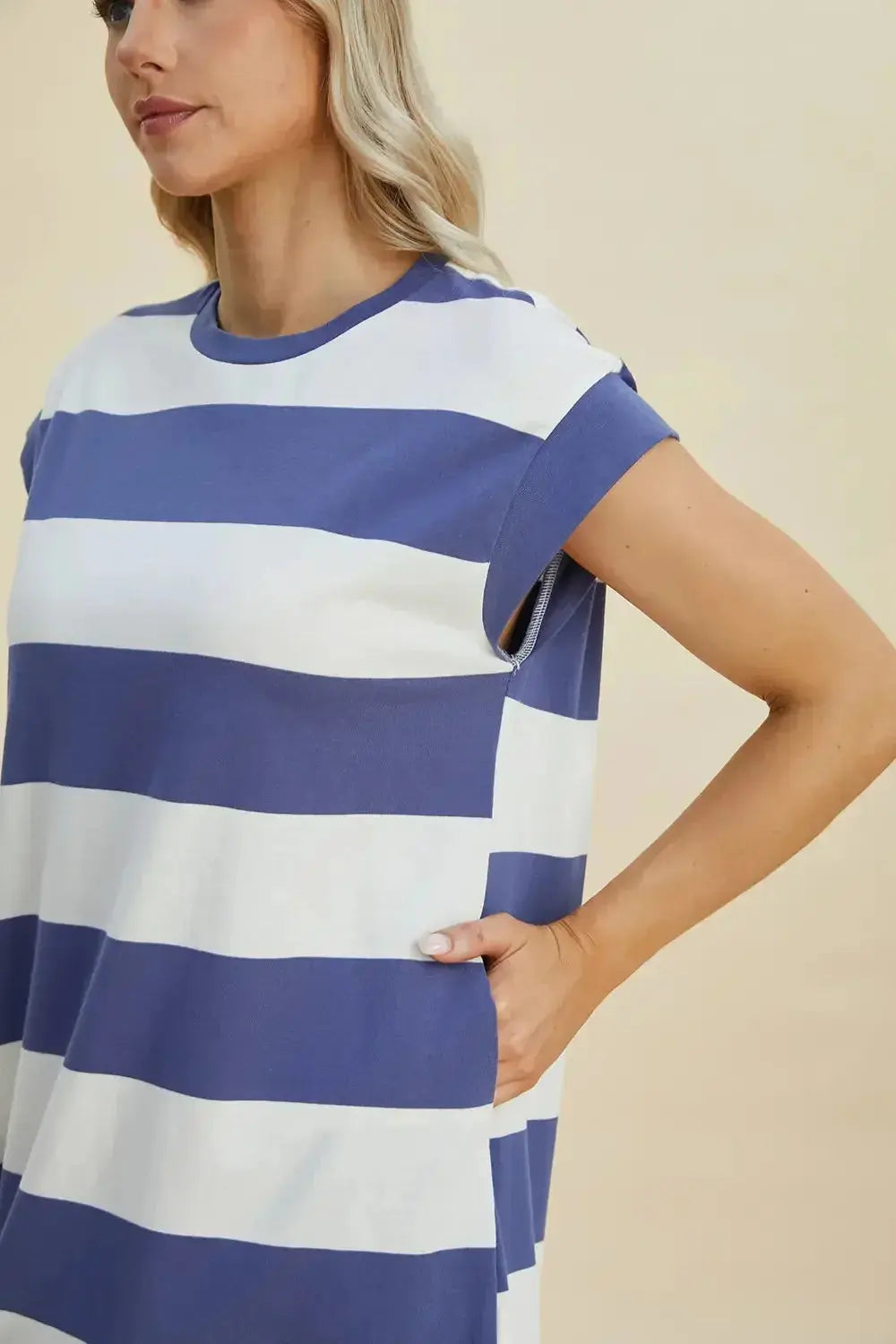 Women's casual striped mini dress with round neck and cap sleeves, from Trendsi, featuring a stylish and comfortable design.