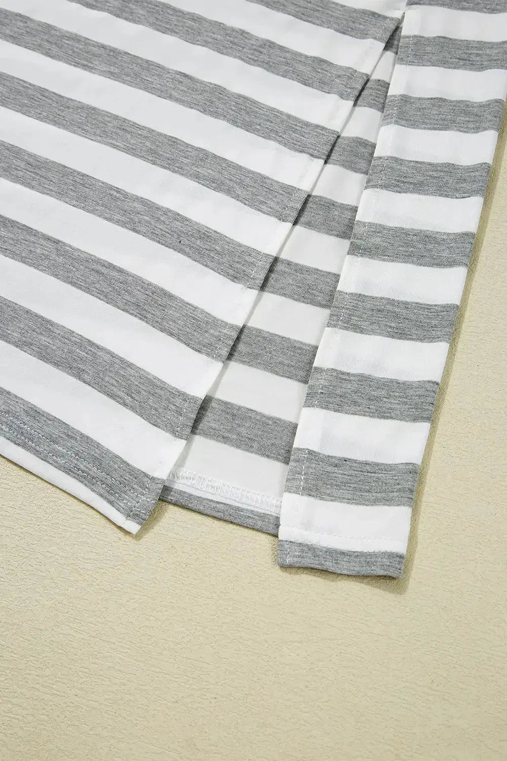 Women’s casual striped V-neck midi T-shirt dress by Plush Fashion Hub, featuring a comfortable fit and stylish design.