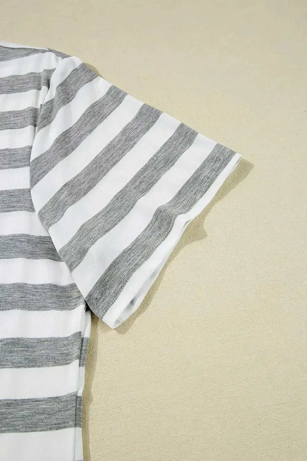 Women’s casual striped V-neck midi T-shirt dress by Plush Fashion Hub, featuring a comfortable fit and stylish design.