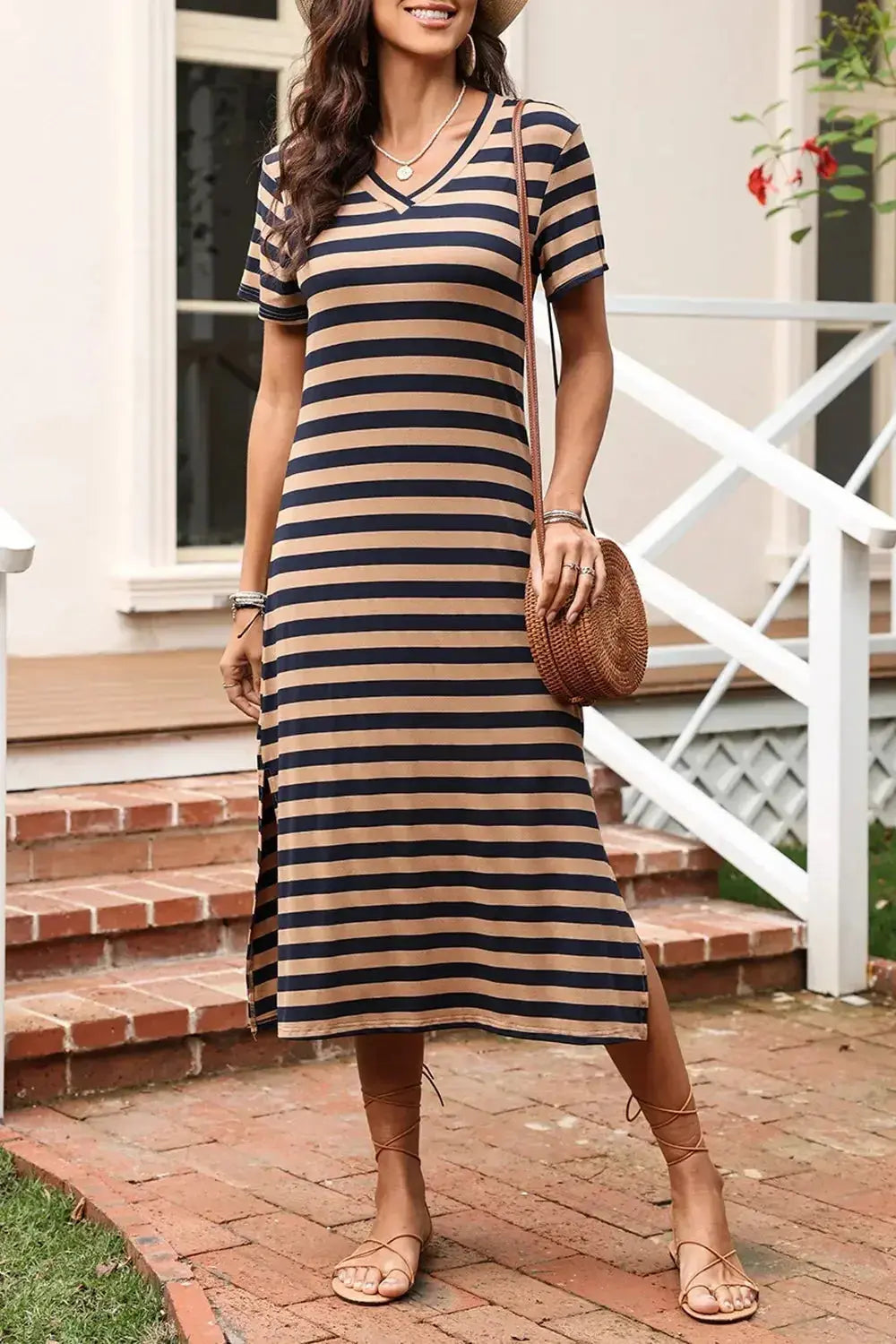 Women’s casual striped V-neck midi T-shirt dress by Plush Fashion Hub, featuring a relaxed fit and classic stripe pattern.
