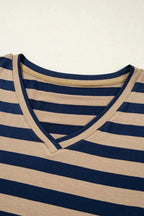 Women wearing a striped V-neck midi T-shirt dress by Plush Fashion Hub, casual style with a relaxed fit and mid-length design.