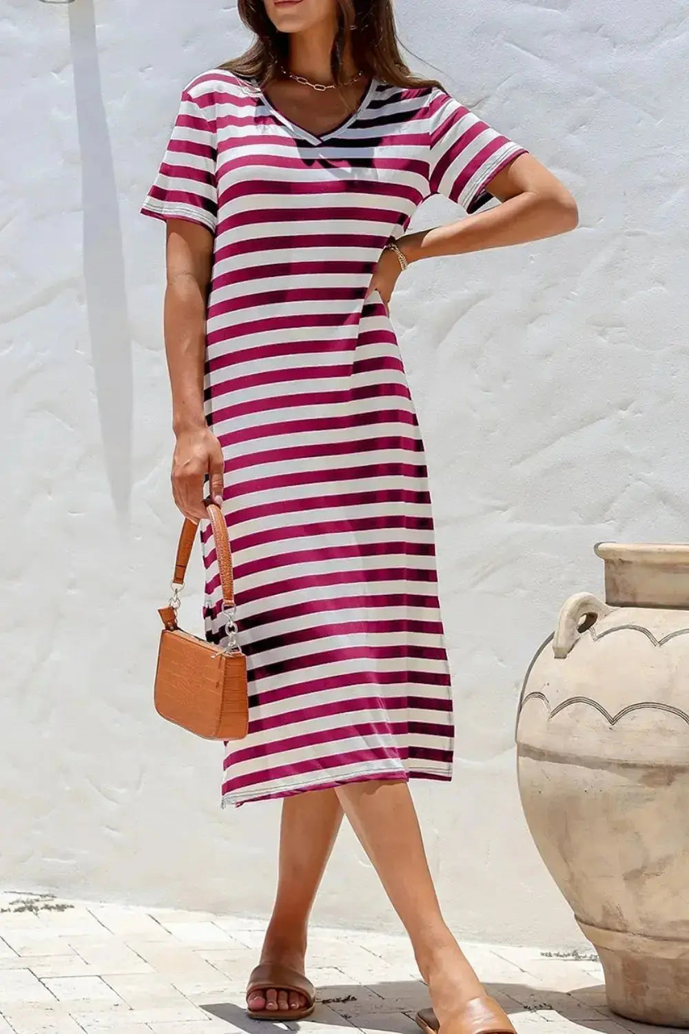 Women’s casual striped V-neck midi T-shirt dress by Plush Fashion Hub, featuring a relaxed fit and comfortable fabric.