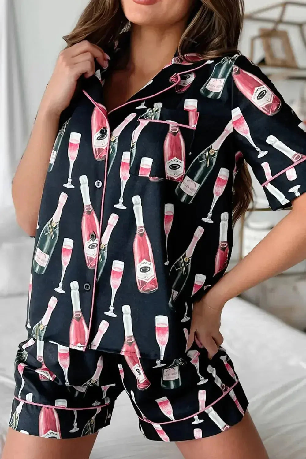Women’s champagne print short sleeve pajama top and shorts lounge set by Trendsi, featuring a stylish and comfortable sleepwear design.