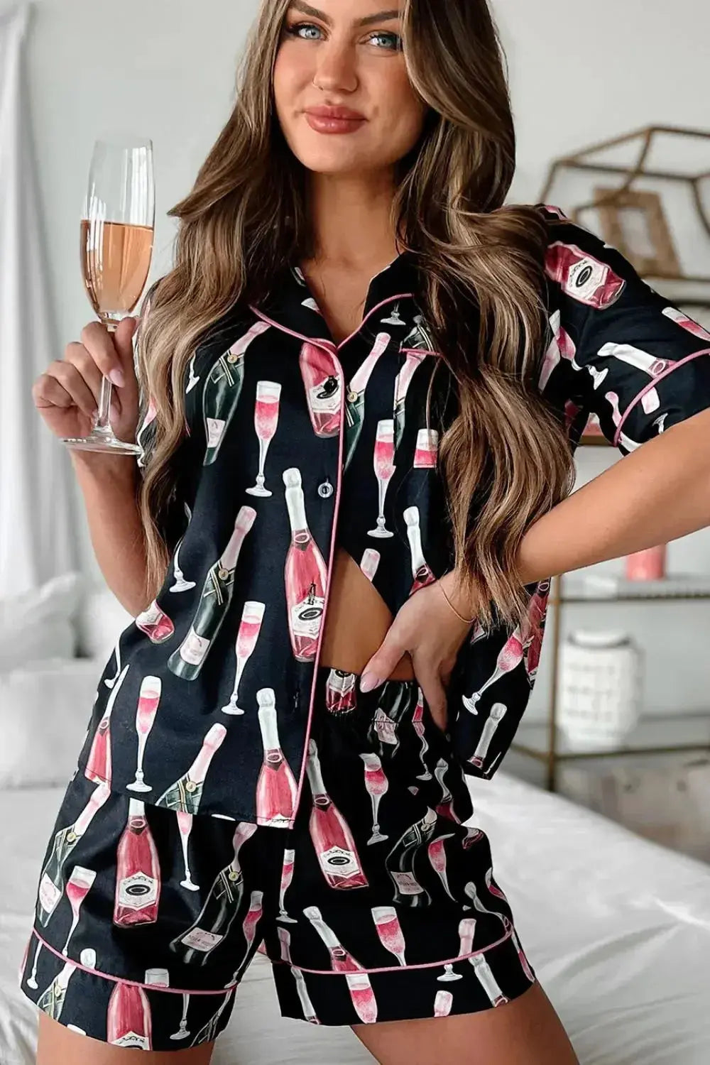 Women's champagne print short sleeve pajama top and shorts lounge set by Trendsi, comfortable sleepwear with stylish pattern.