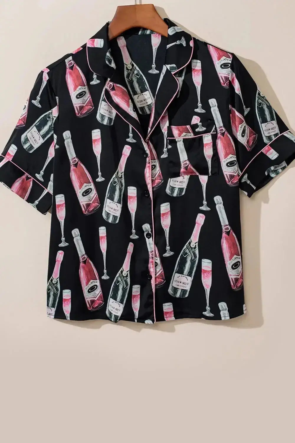 Women's champagne print short sleeve pajama top and shorts lounge set by Trendsi, comfortable sleepwear with elegant design.