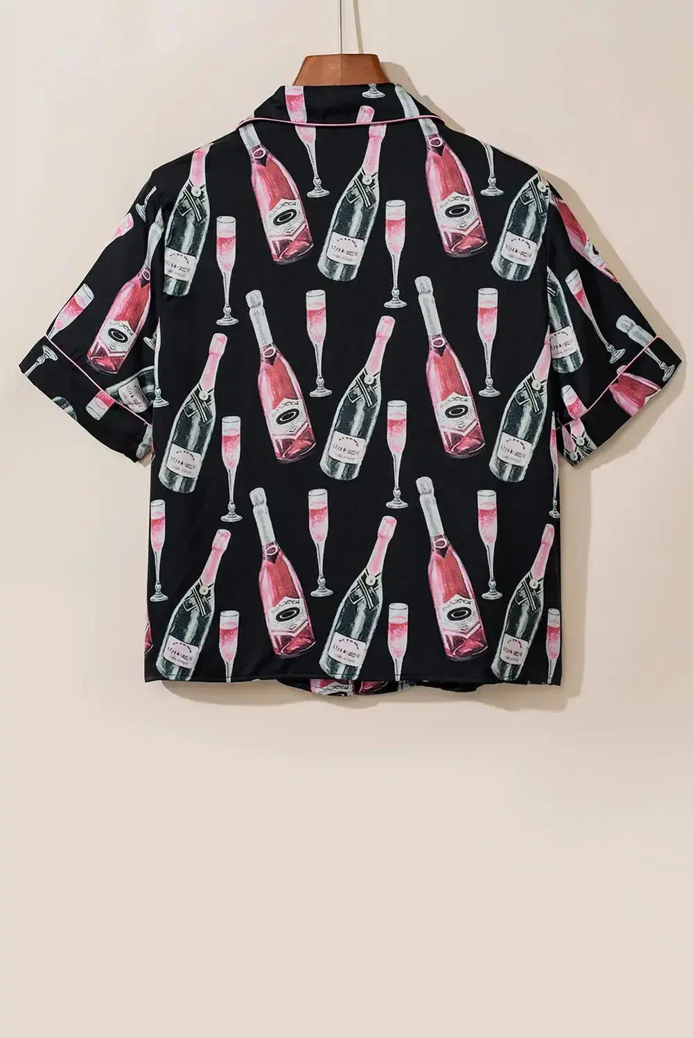 Women's champagne print short sleeve pajama top and shorts lounge set by Trendsi, featuring a relaxed fit and elegant design.