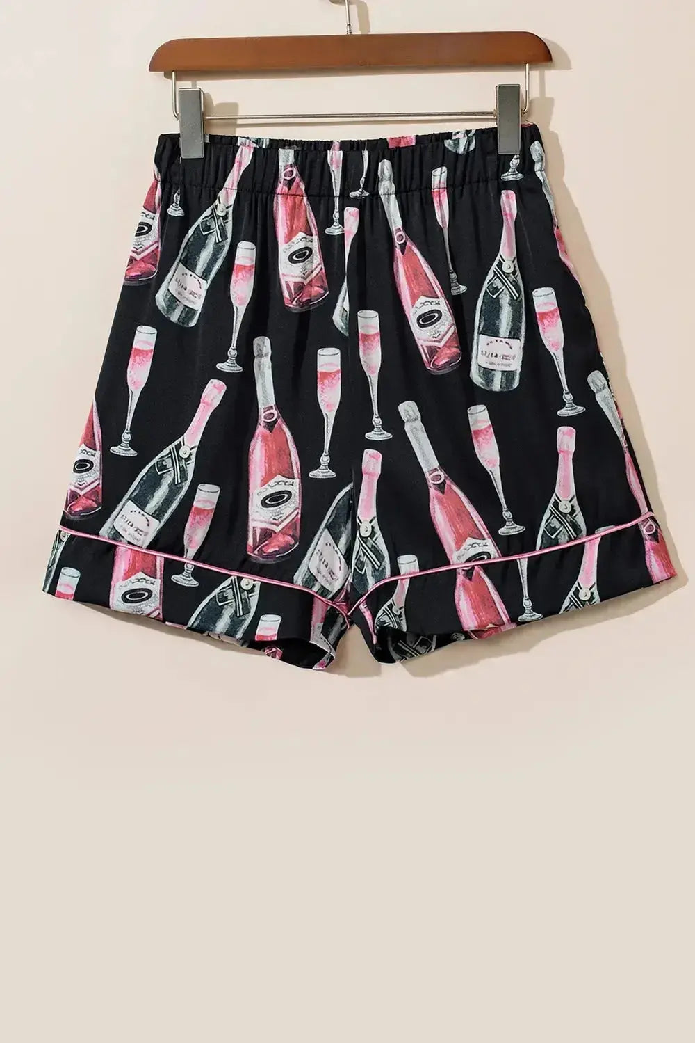 Women's champagne print short sleeve pajama top and shorts lounge set by Trendsi, comfortable sleepwear with elegant pattern.