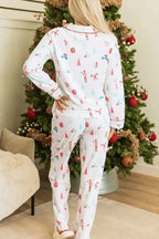 Women’s Christmas print long sleeve collared pajama lounge set by Plush Fashion Hub, featuring festive holiday-themed design.